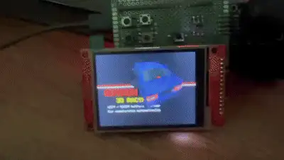 The game running on the ESP32-S3 and an ILI9341 display: the start screen with the spinning 3D car, then the race with the road, buildings, traffic and the speedometer