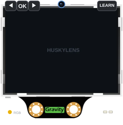 The DFRobot HuskyLens on the Velxio canvas, with its screen, Gravity connector and learn button